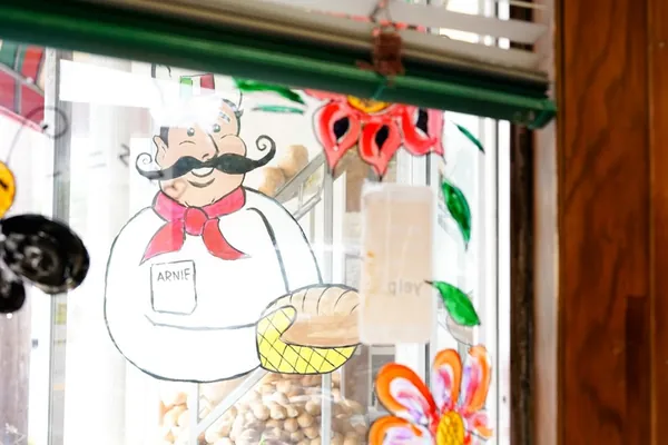 The ARNIE baker decal on the shop window