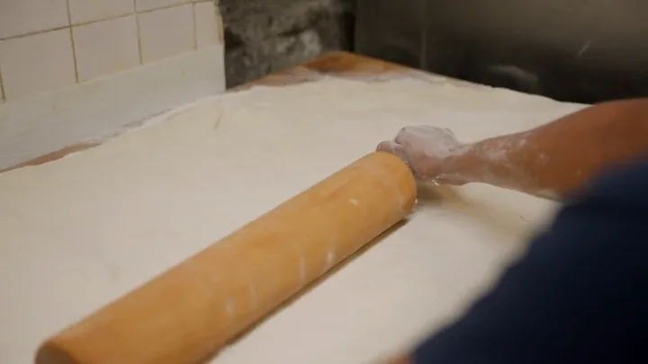 Dough rolled by hand